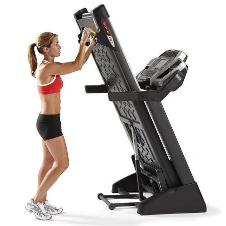 Woman with Folding Treadmill