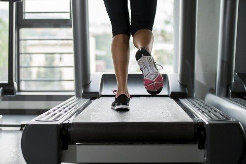 Woman Running on Treadmill